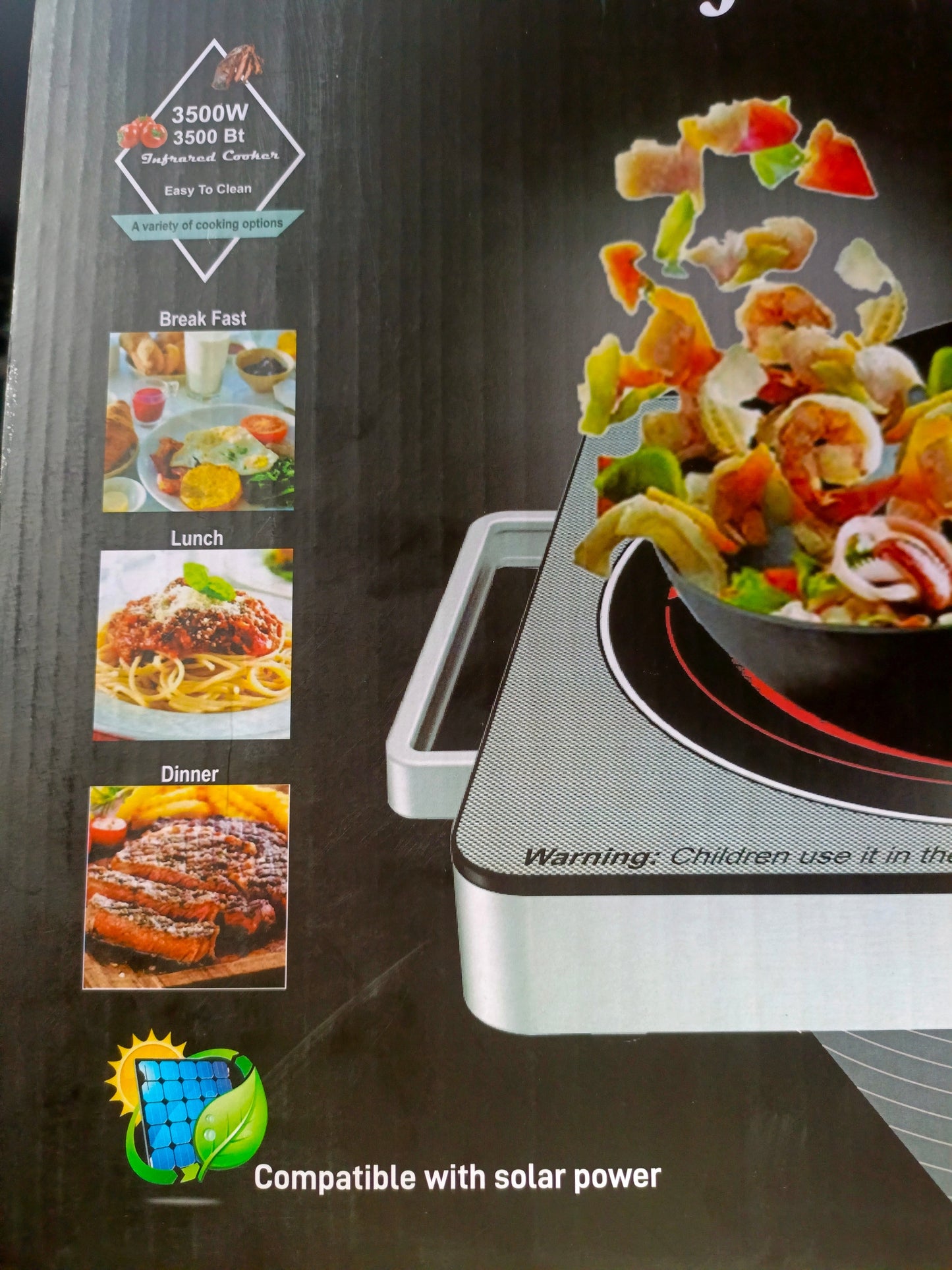 Portable electric stove with food images and solar power compatibility on a dark background